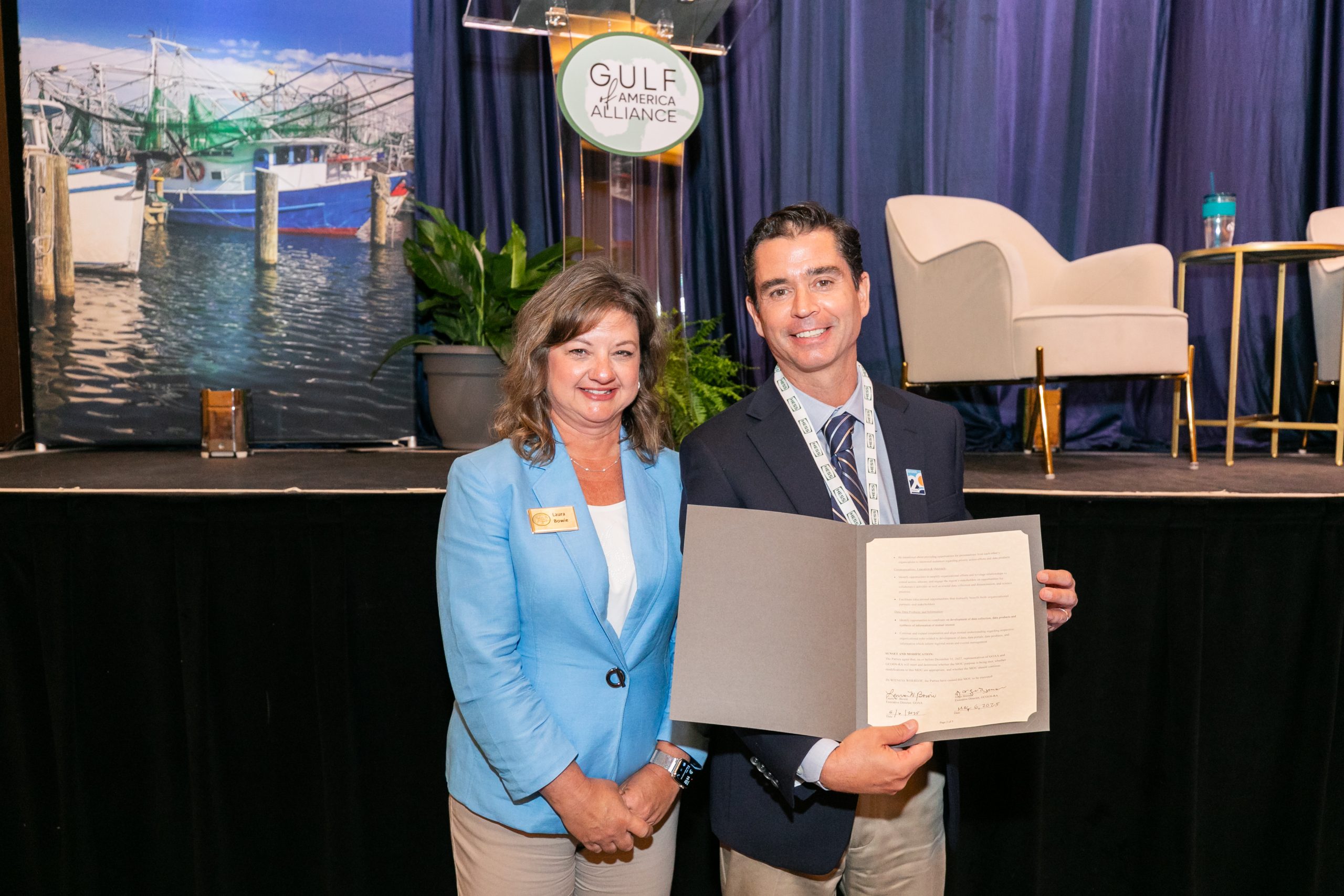 Laura and Jorge MOU signing GCOOS Executive Director Dr. Jorge Brenner and Laura Bowie, Executive Director of the Gulf of America Alliance (GOAA), sign an updated memorandum of understanding.
